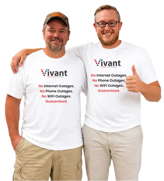Two Vivant team members in Vivant t-shirts